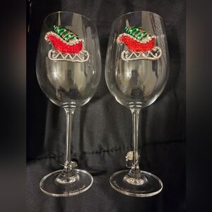 Festive Holiday Wine Glass Set with Red and Green Sleigh Design